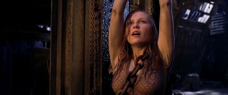 Spider-Man 2 screenshot of MJ tied up with a big chain around her