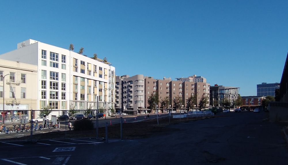 A few city blocks with 3-6 story buildings and a couple taller ones in the back