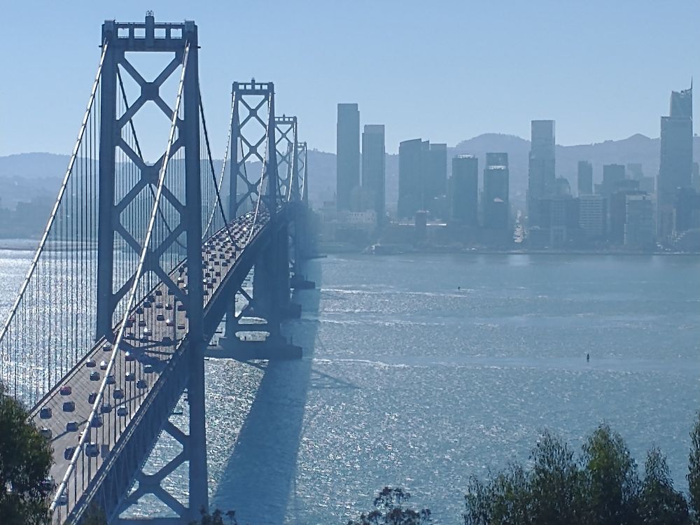 The Bay Bridge West span with South of Market skyline in background on a hazy day 