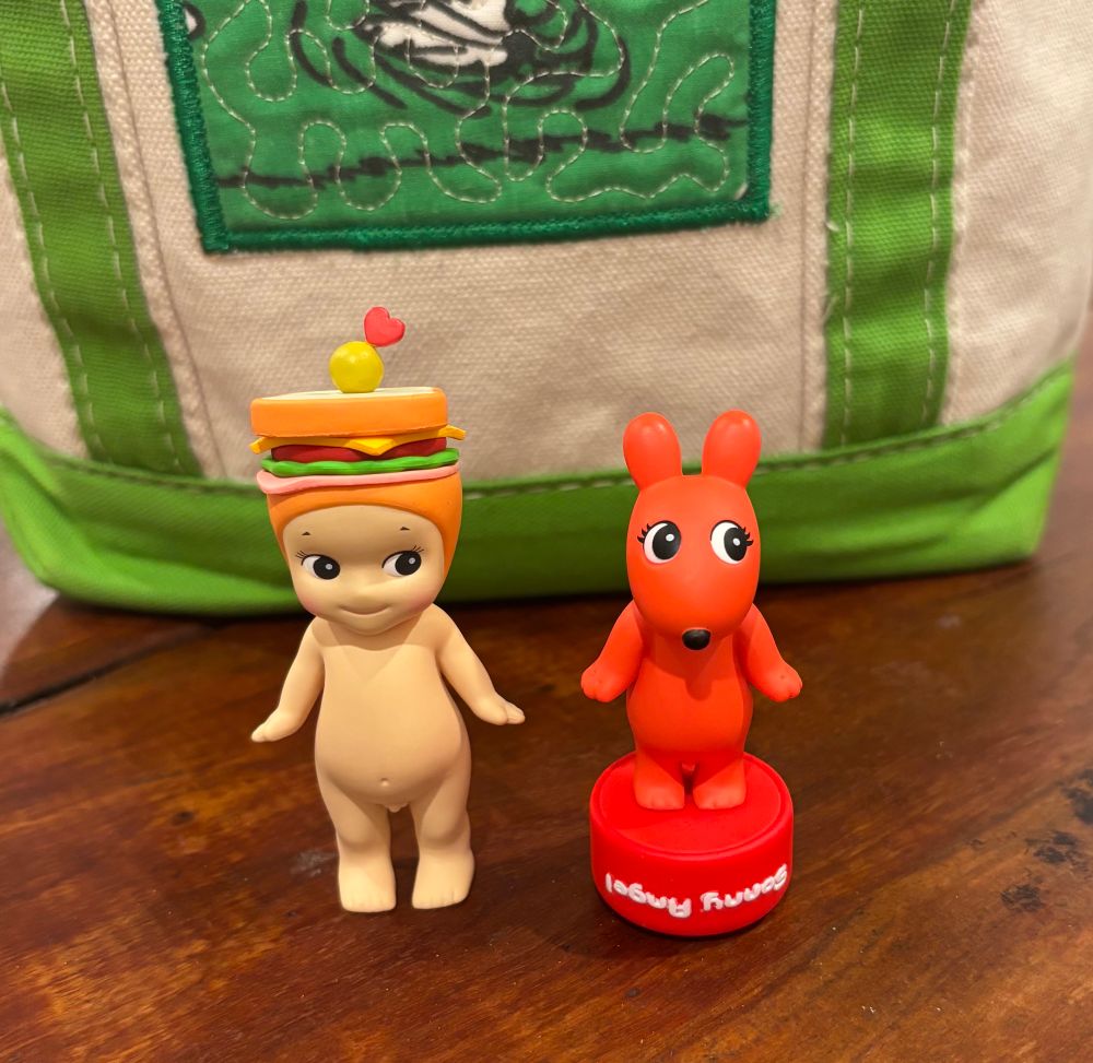 Sonny angel snack series. On the left is the sandwich Sonny angel and on the right is the Robby (red rabbit looking figure)