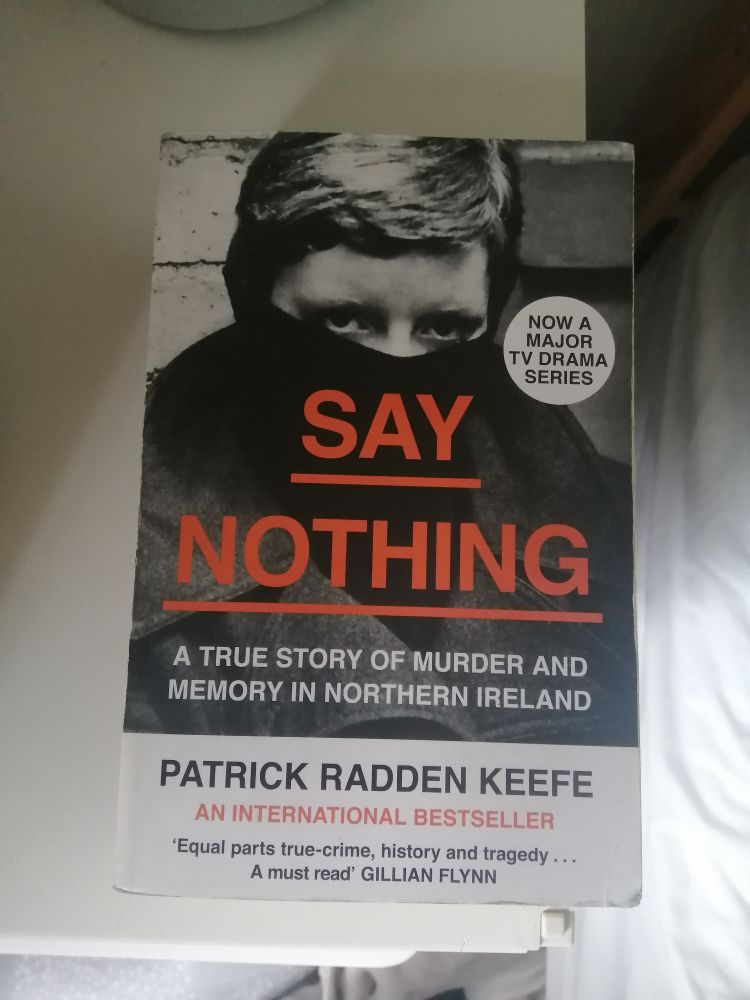 Say Nothing by Patrick Radden Keith, which has a cover featuring Delours Price looking like a young Eddie Howe. 