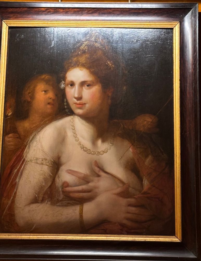 Beautiful Renaissance woman and a weird little freak.