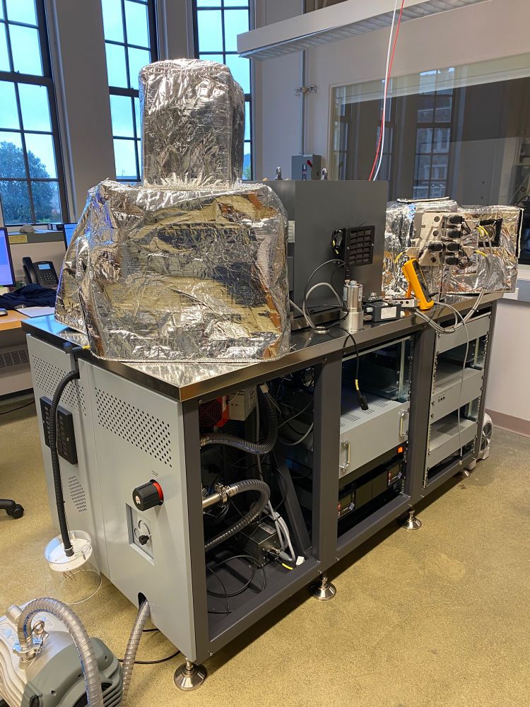 A thermal ionisation mass spectrometer covered in reflective covers as it ‘bakes’ to improve the vacuum.