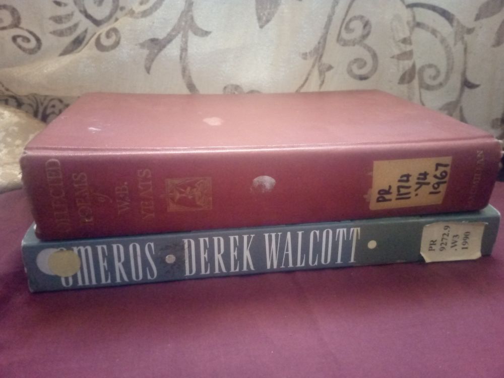 Library copies of Collected Poems of W.B. Yeats by W.B. Yeats and Omeros by Derek Walcott
