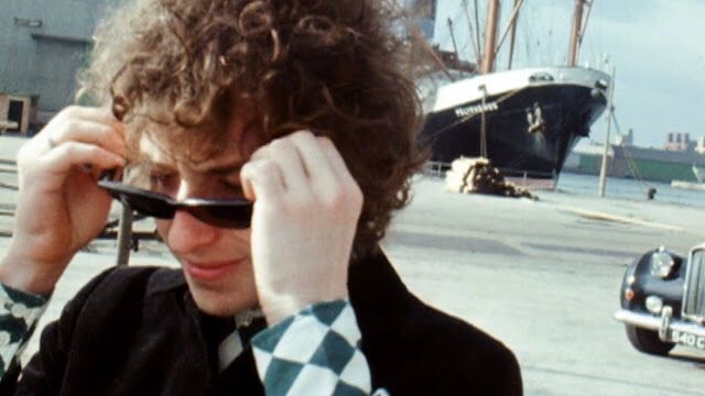 Bob Dylan in Liverpool, in front of Blue Funnel’s Patroclus with Austin Princess limo on May 14th 1966