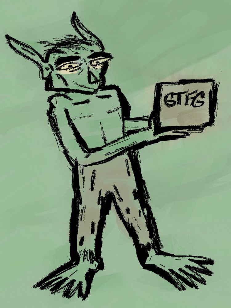 A flat-footed, long-eared Goblin holding a book that says “GTFG” on the front, which stands for “Grub, Tussle, Frolic: Goblins”. 