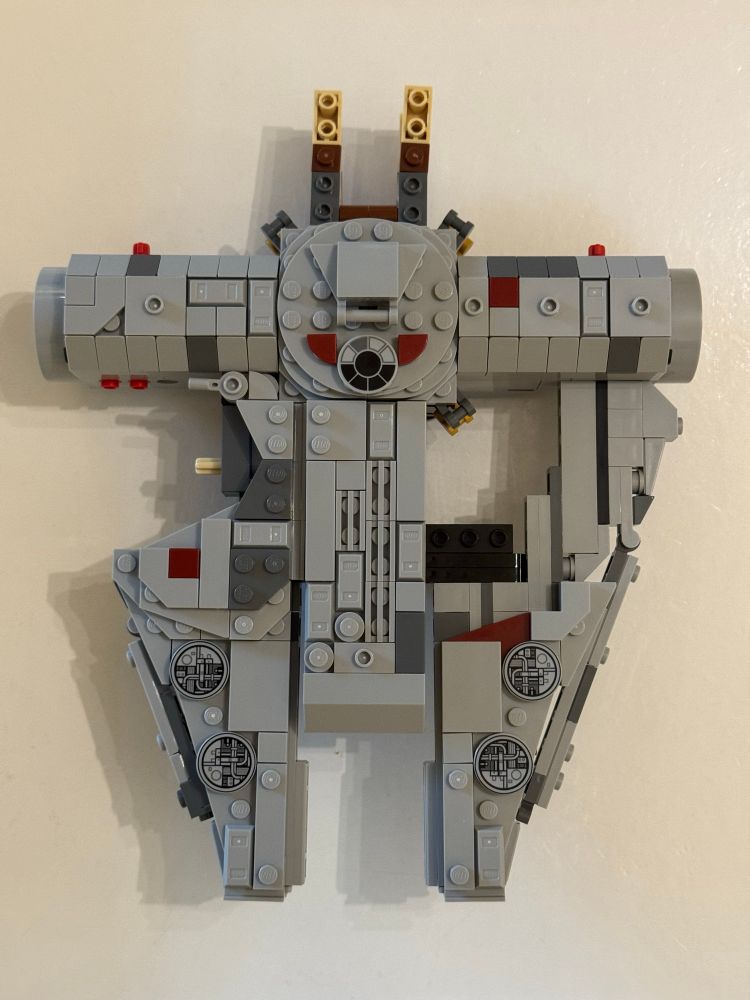 Lego Millennium Falcon parts that look like a T with two mandibles. 