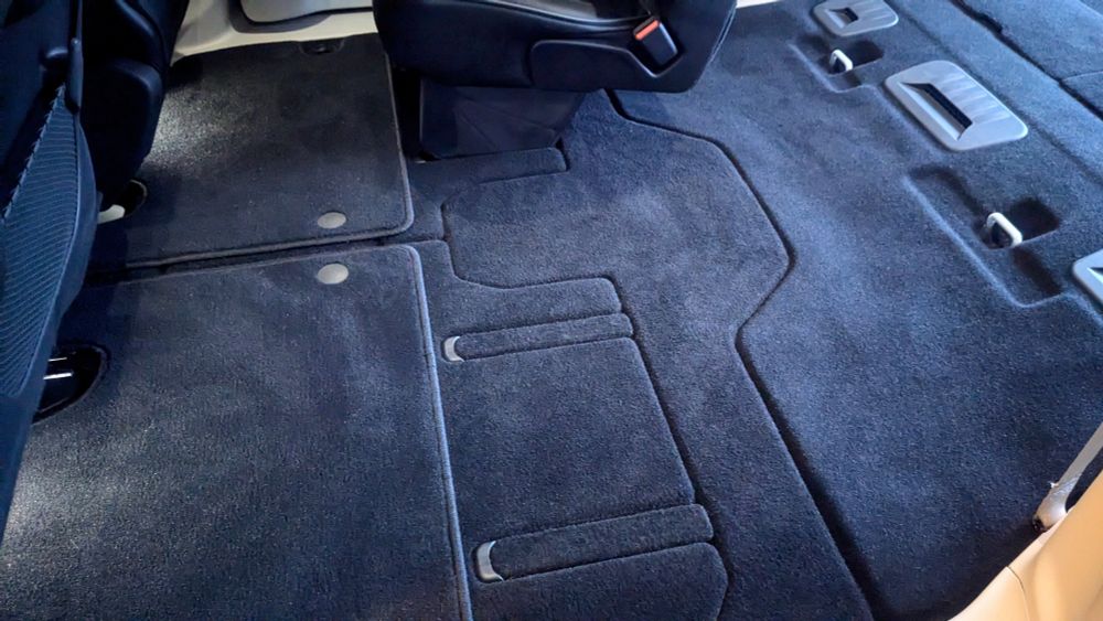 Interior floor of a Chrysler Pacifica, freshly detailed and looking like new