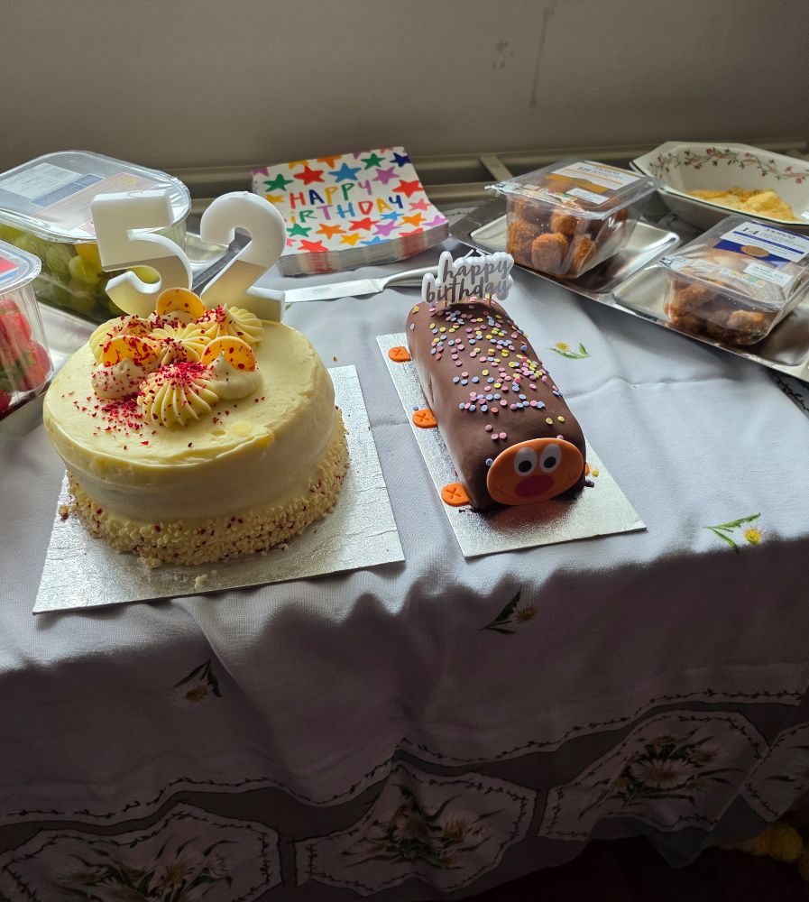 My birthday cake with a 5 candle and a 2 candle on it, in that order. Someone clearly made a mistake!