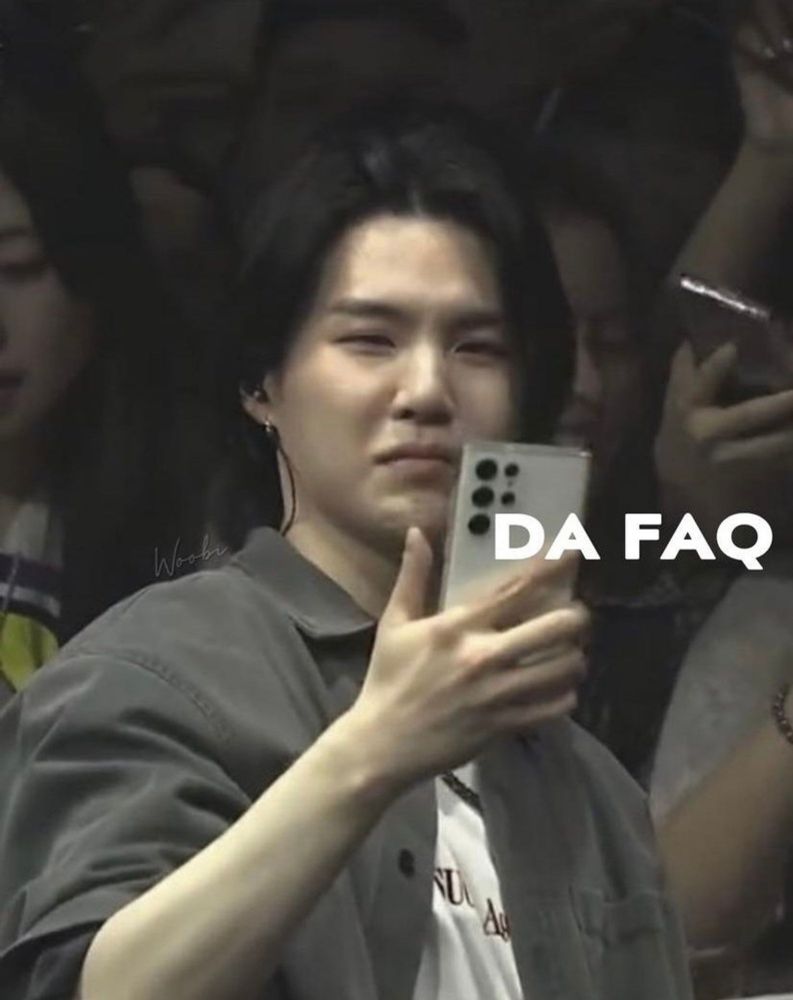 Suga looking at a phone with a disgusted expression on his face. Text reads DA FAQ