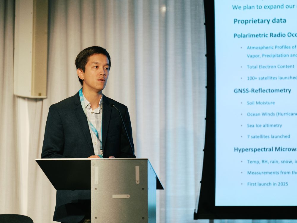 A photo of Dr. Vu Nguyen, Spire GNSS Radio Occultation (RO) Technical Director, presenting at the EO Summit 2025. He delved into our satellite constellation and capabilities from RO and Reflectometry to our upcoming hyperspectral microwave sounders (HyMS).