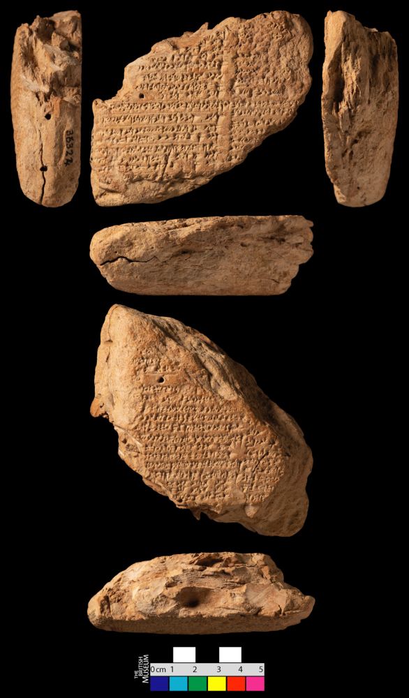 Photo of a clay tablets fragment with cuneiform writing shown from the front, back, and sides. There is a small ruler at the bottom that is 5cm long which suggests the tablet is about 8-9cm wide