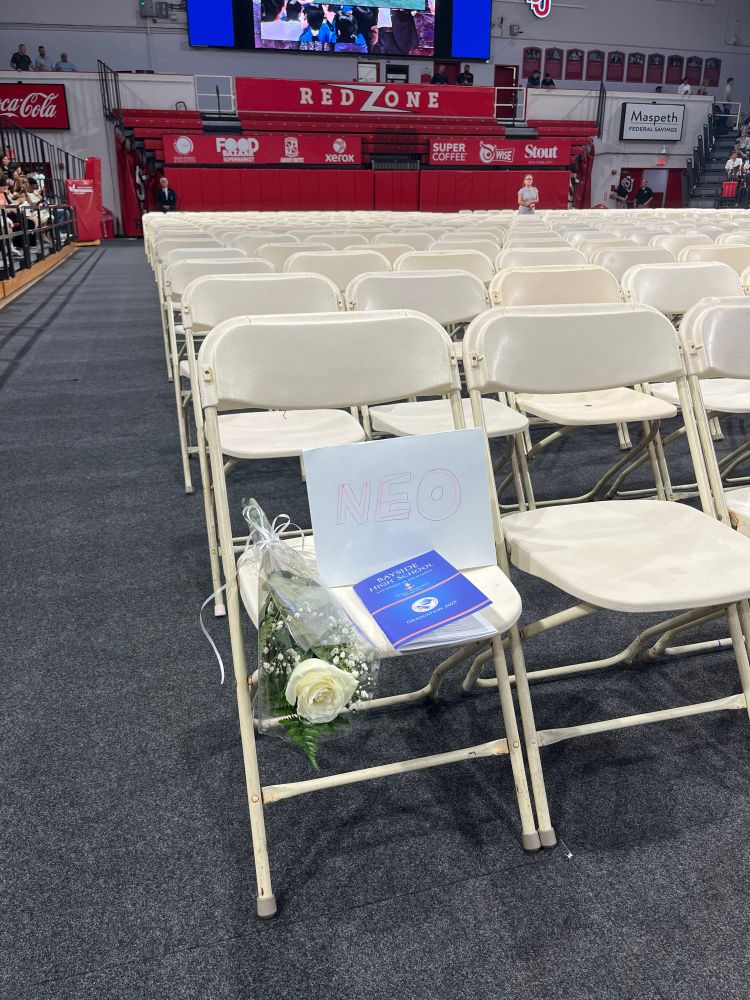 Seat reserved for Neo Secaira, who would have graduated today