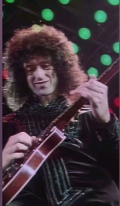 Queen playing Don't Stop Me Now