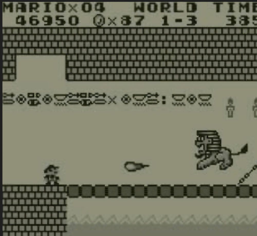 Szene aus Super Mario, Welt 1, Level 3. Kampf gegen den Endgegner-Löwen.