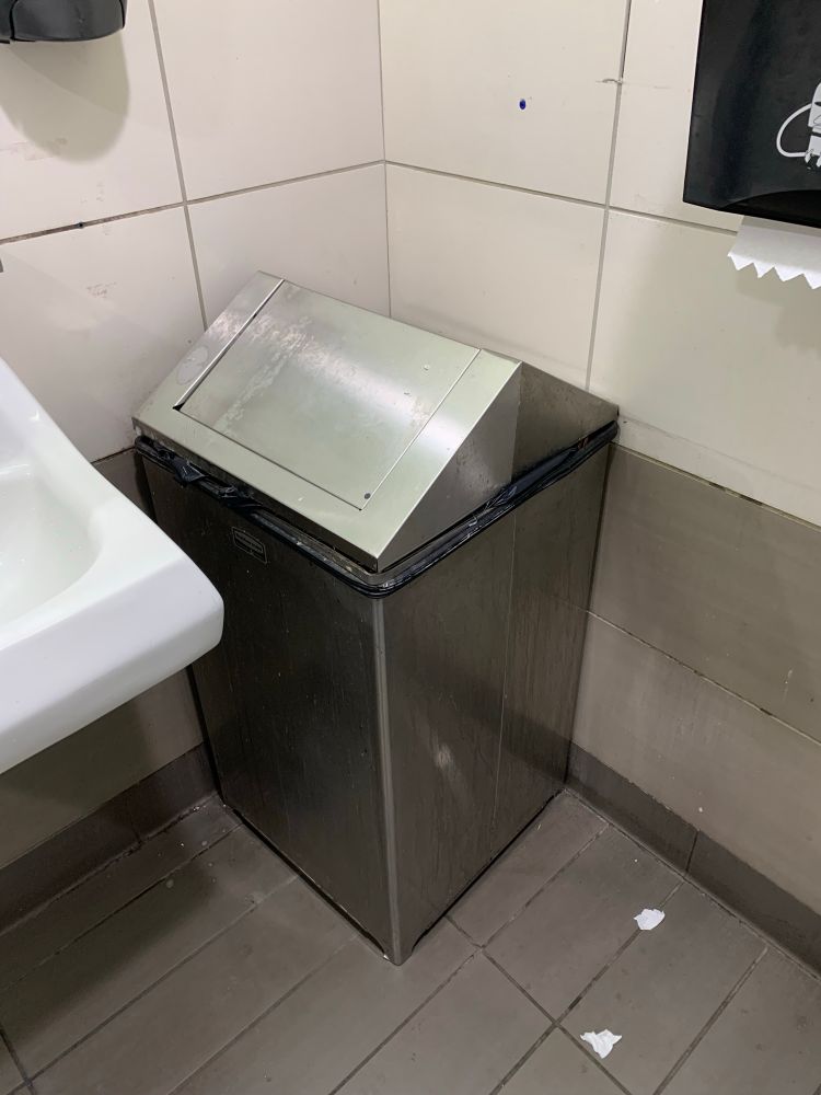 A garbage can that resembles a Tesla cybertruck 