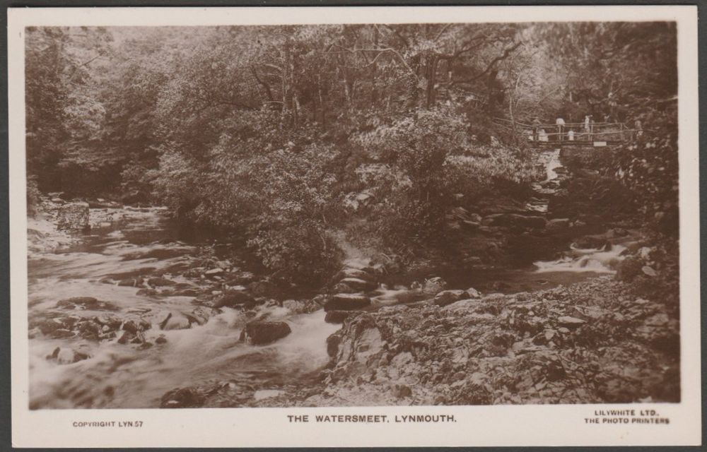 Sepia real photographic postcard showing a view of the Watersmeet at Lynmouth in North Devon.
Published by Lilywhite Ltd, No LYN 57, c.1920s.
Postally unused.
Very good condition, with very slight corner bumps.