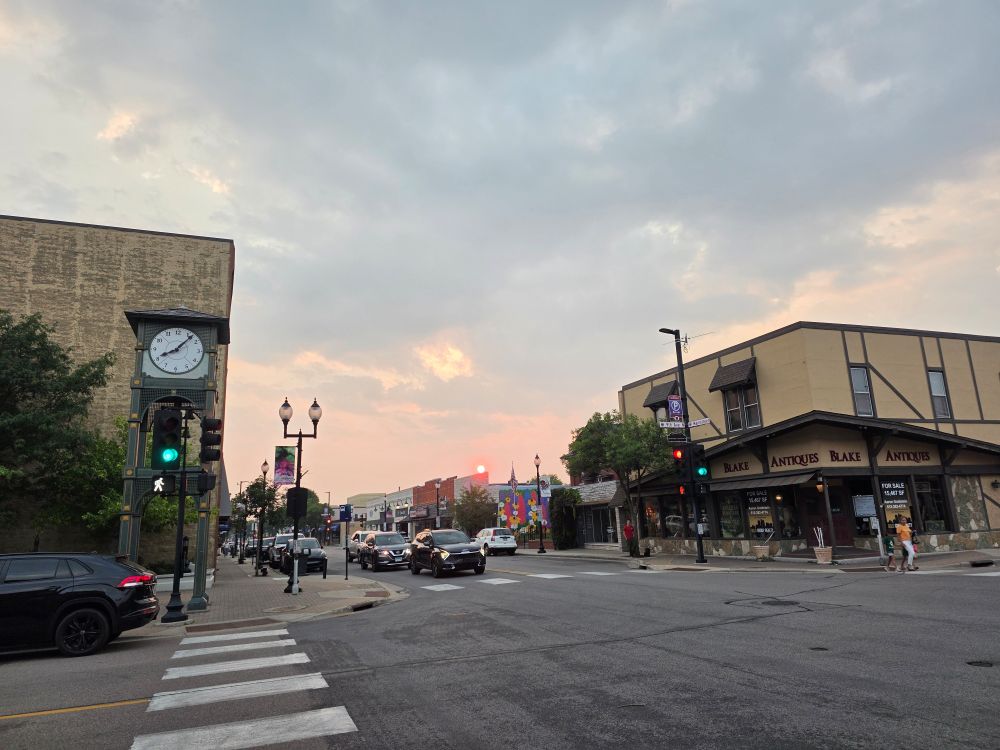 Hopkins main Street in the evening with the Smokey son just about to sit behind a building 