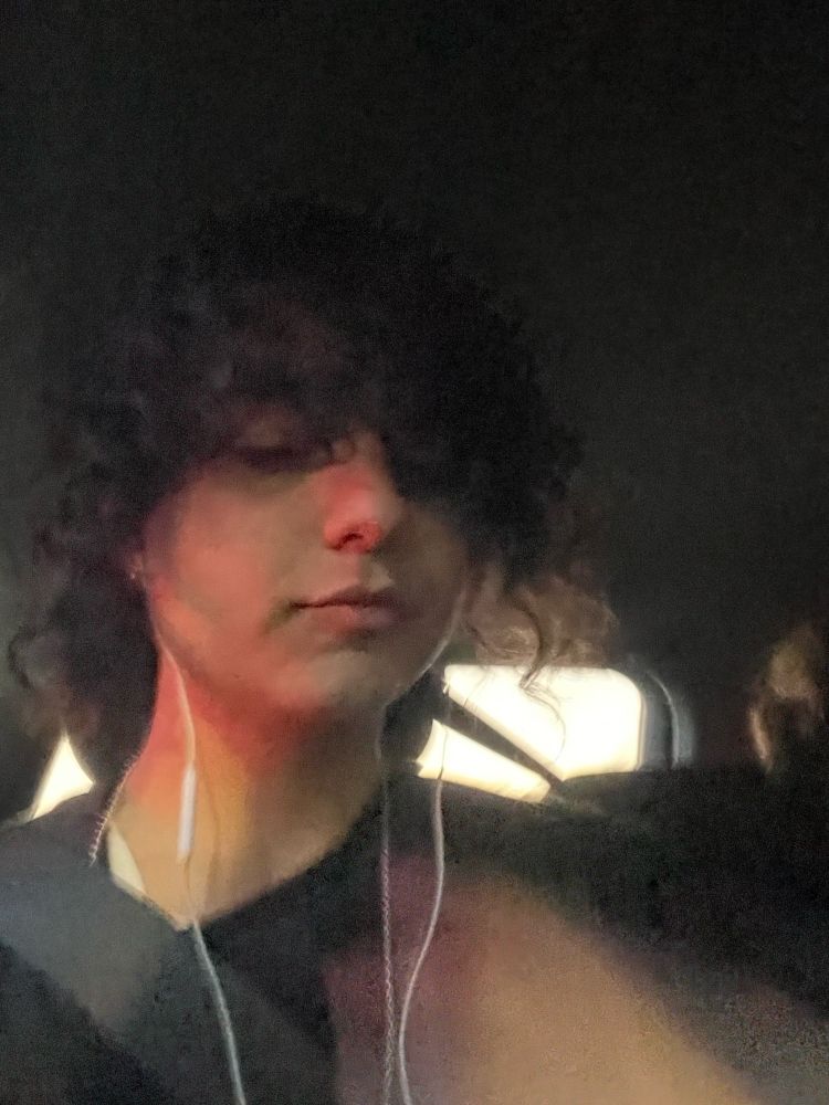 Stupid gay nerd! What’s she listening to? Idk 
