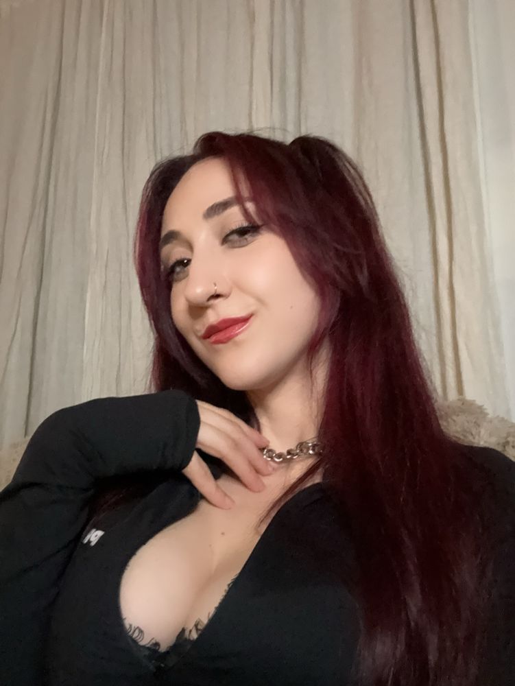 A selfie of a bratty goth redhead goth goddess smirking at you know how fucked you are going to be after your first send