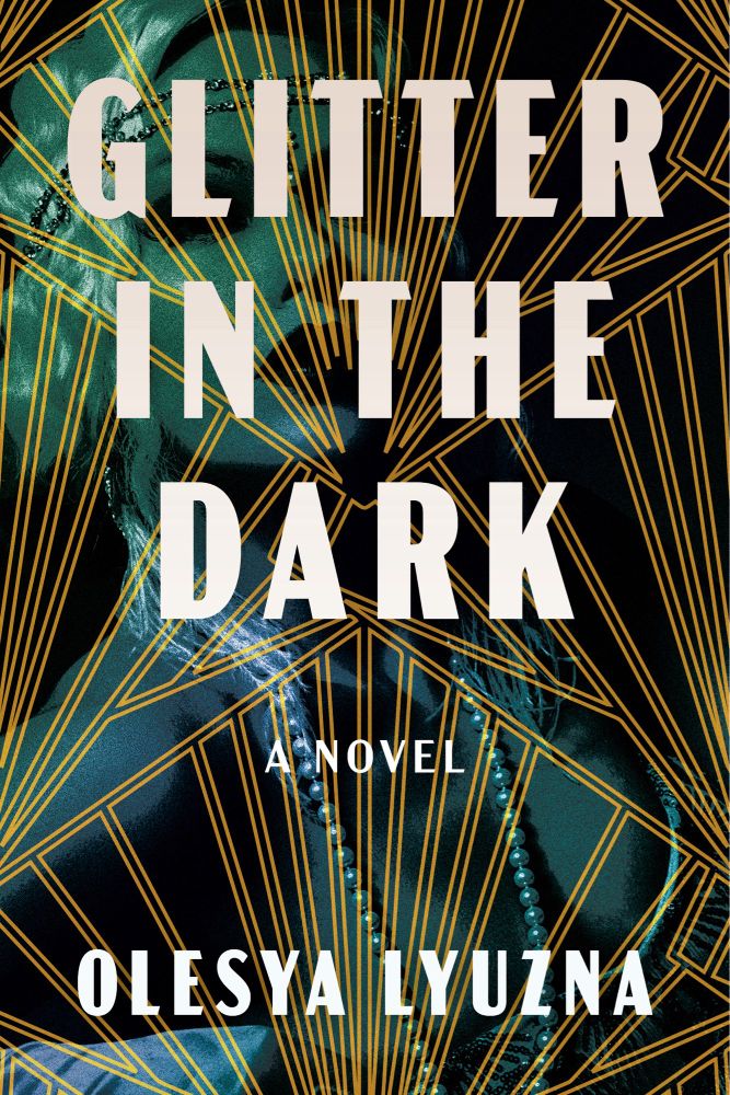 Book cover with text reading “Glitter in the Dark. A novel. Olesya Lyuzna” against a geometric art deco pattern of gold lines. Behind that is a shadowy blue-green image of a blonde flapper woman wearing a string of pearls