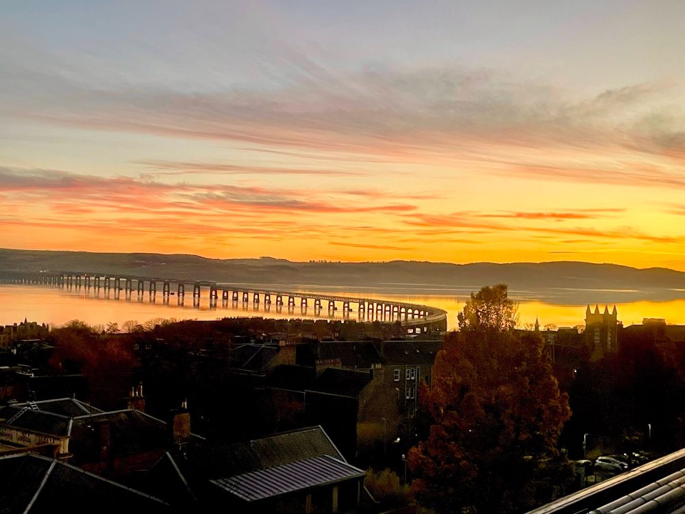 Sunset over the tay bridge from The school of life sciences building in dundee