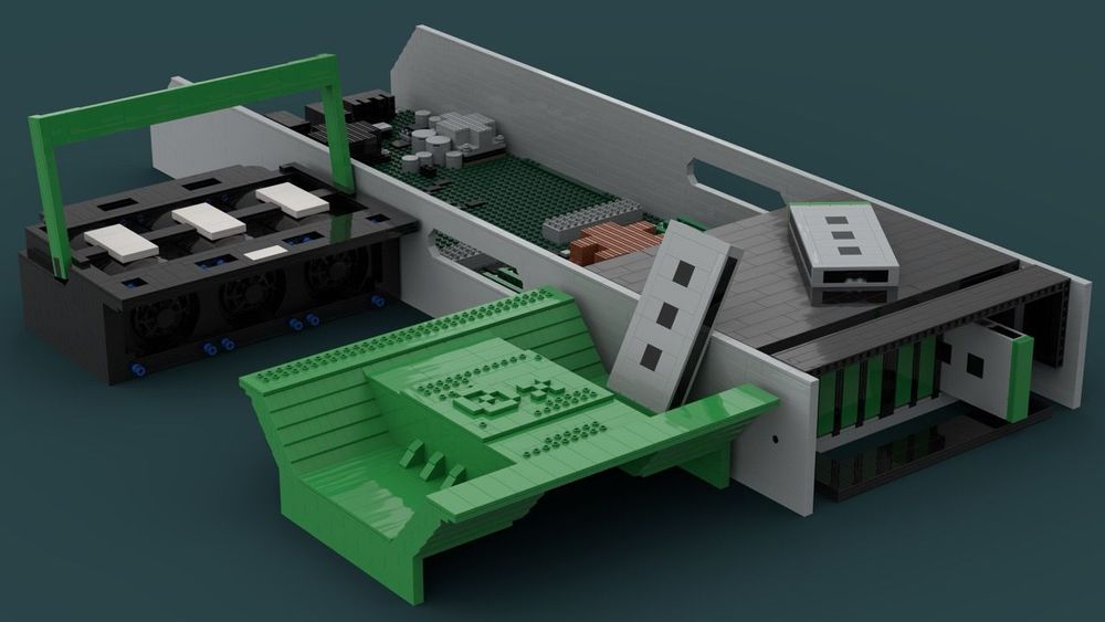 LEGO Studio creation of Oxide server hardware components showing green circuit boards, gray chassis parts, and various electronic modules arranged to display internal architecture