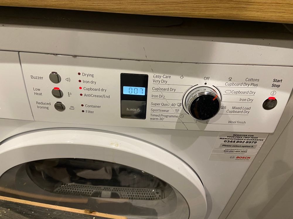 A tumble dryer displaying 0:07 remaining on the cycle