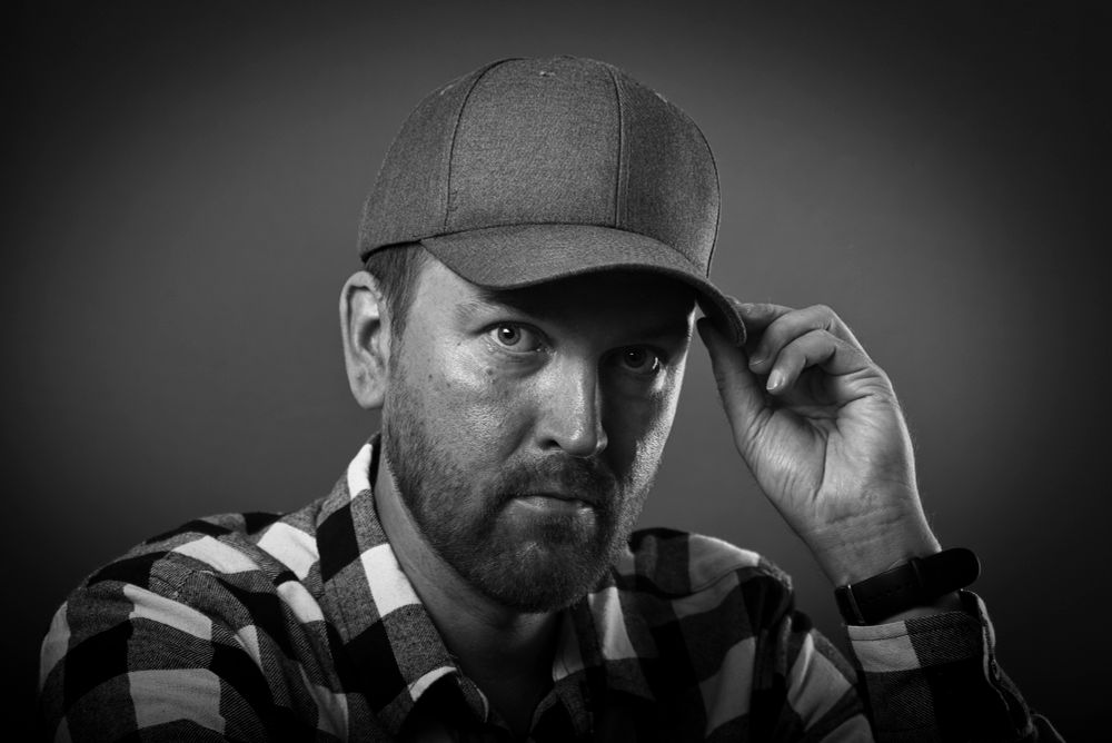 Portrait of a man with a hat