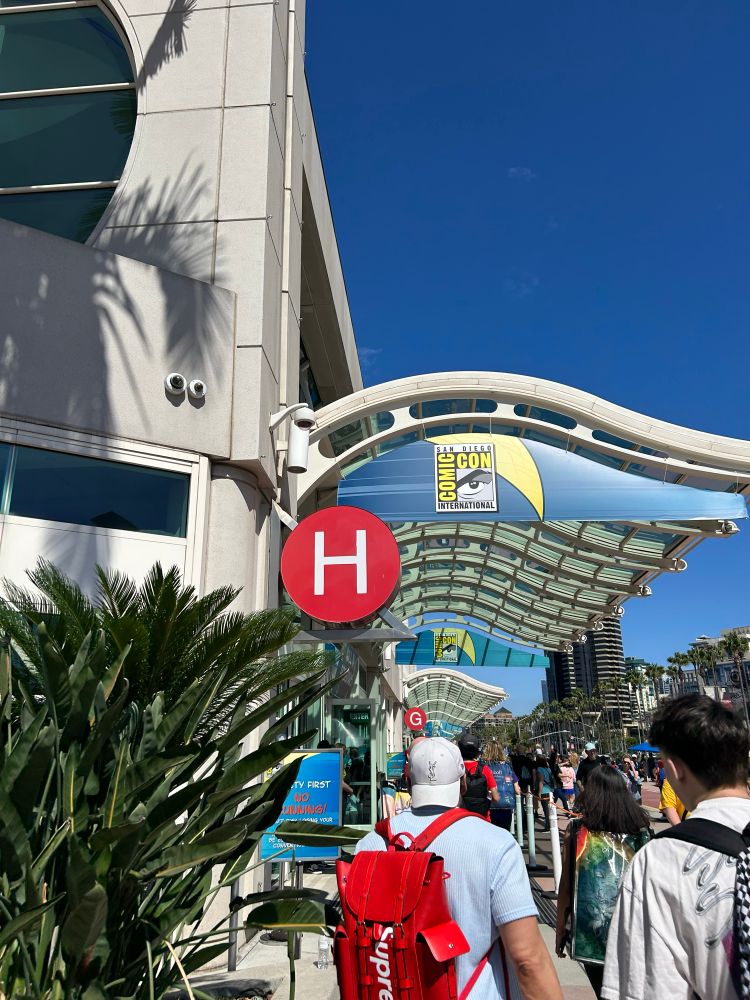 Classic red Hall H circular sign with the San Diego Comic-Con logo as fans enter