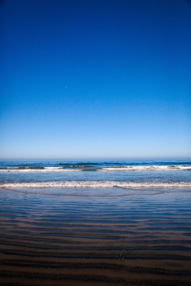 Amateur photograph of a beautiful sunny day on a California beach. 