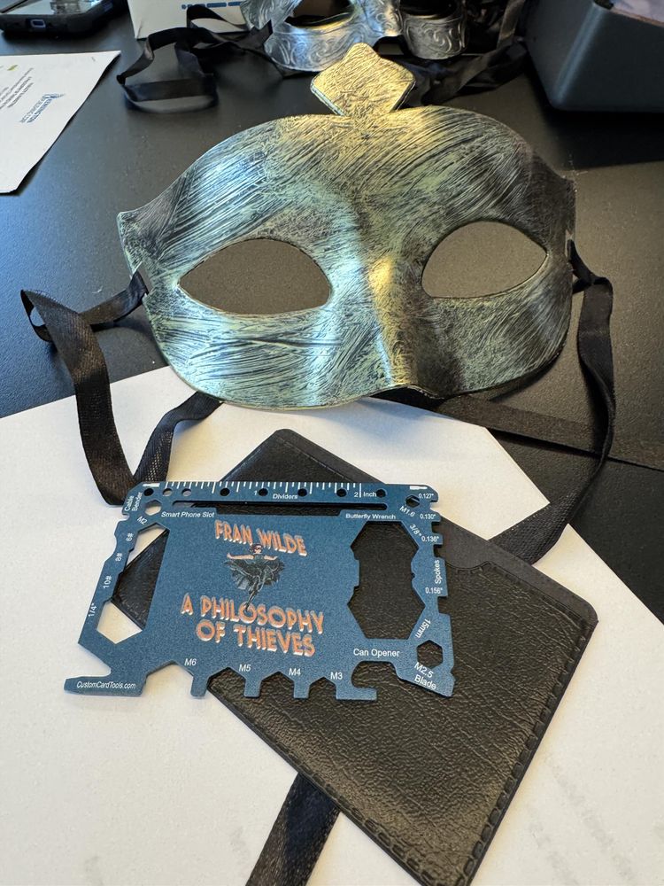 A gold mask an a thieves multitool