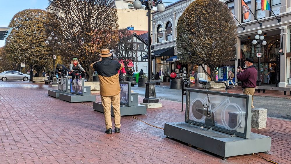 A few people having fun with the new art installation on Government Street in Victoria, BC.