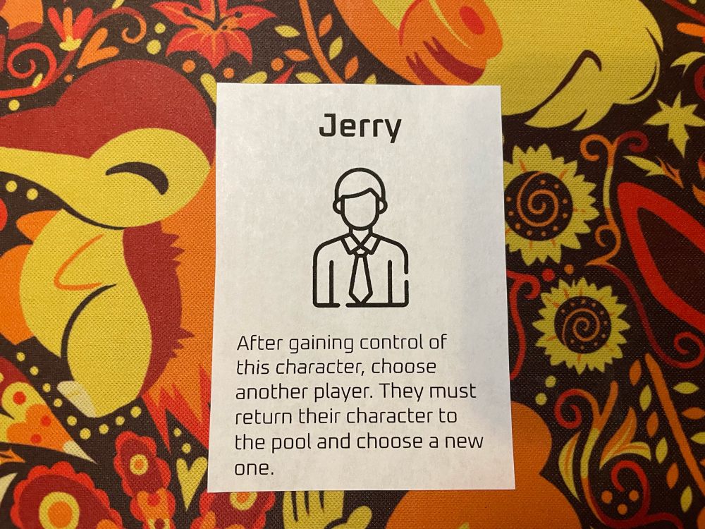A print out of a card named “Jerry” with a symbol of a man with a tie. There is some game text below for a prototype game 