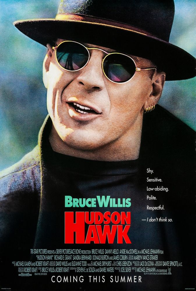 Movie poster for Hudson Hawk. Image is of Bruce Willis wearing sunglasses and a fedora