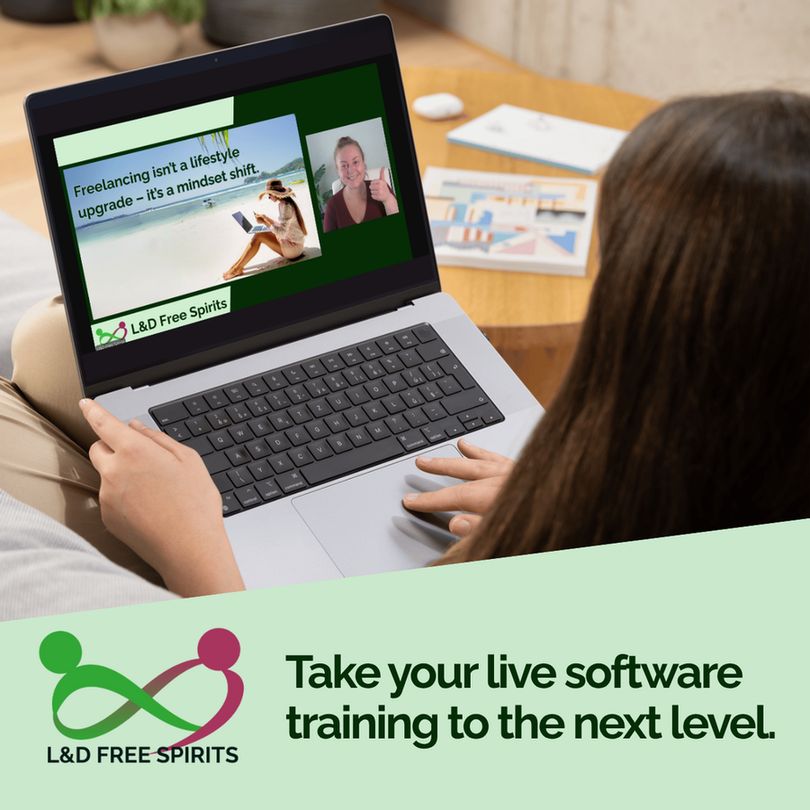 A person is watching a laptop with an L&D Free Spirits webinar slide that reads “Freelancing isn’t a lifestyle upgrade — it’s a mindset shift” alongside a smiling presenter giving a thumbs up. Text on the image says: “Take your live software training to the next level.”