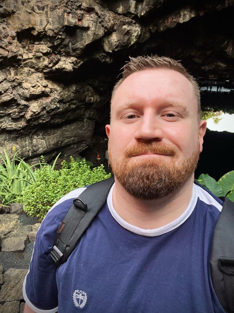 Skinny bitch giving bear face in a cave