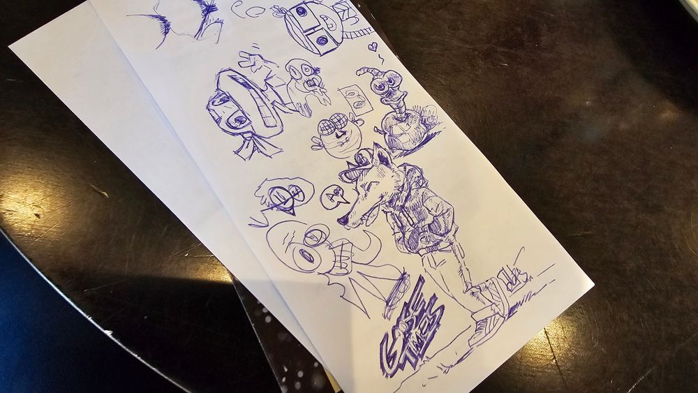 Piece of paper with sketches my son and I did, while having breakfast at the same Café. 