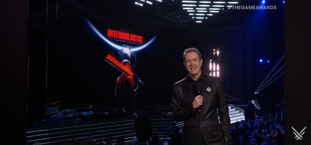 Geoff after the trailer was shown with the key art in the back.