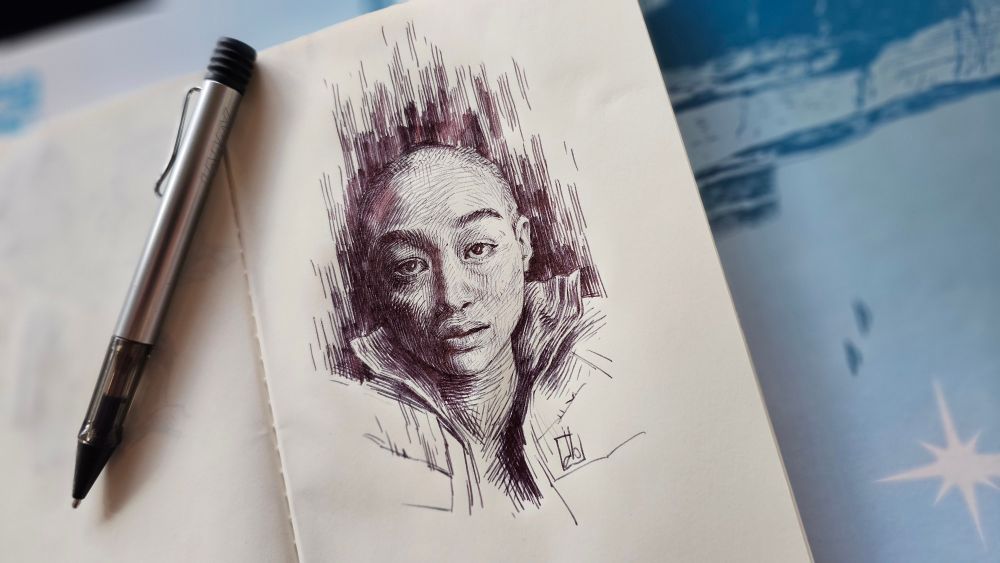 Small ballpen sketch of Jordan from Intergalactic inside a sketchbook.