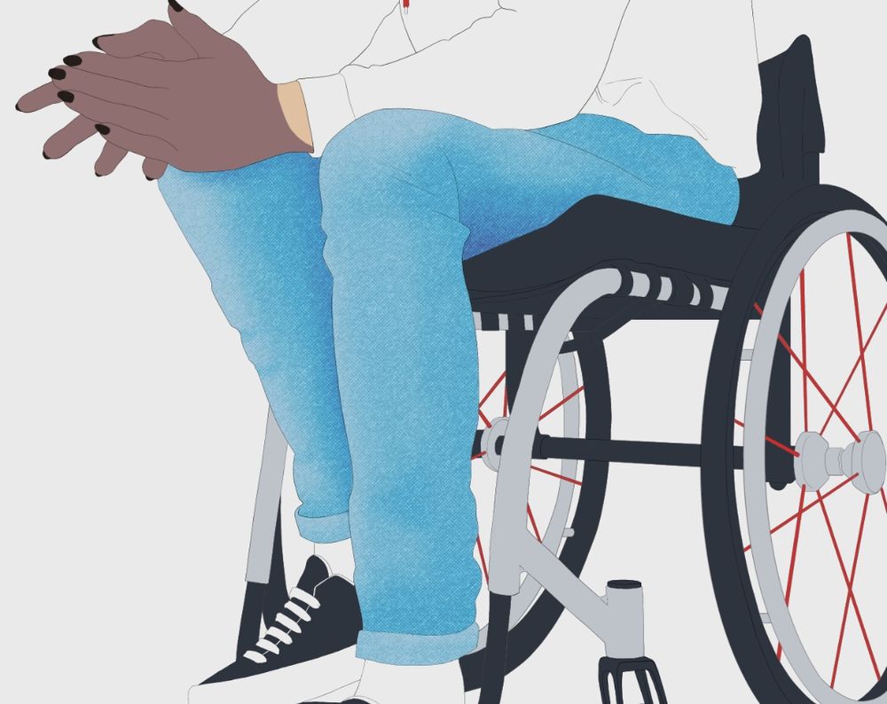 A cropped screenshot of digital art depicting a character sitting in a wheelchair. It's a work in progress, so most of the work done so far is flat colour and lineart. However, the jeans are starting to develop a denim texture. The wheelchair is black and silver, with red spokes in the wheels. The denim is a light blue, hoodie a crisp white, and he's wearing black Vans.