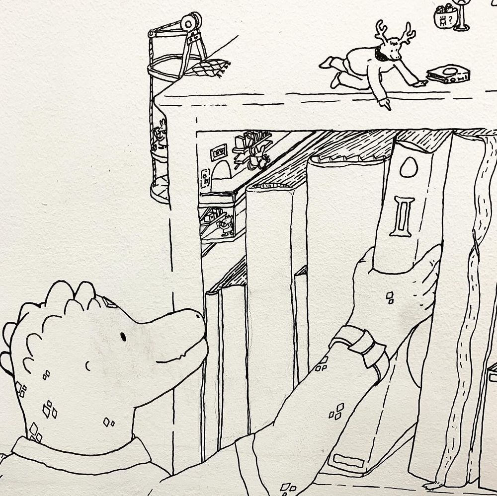 A hand drawn character, with a crocodile head, places a book on a shelf. Sitting a top the shelf is a myriad of miniature characters and figures including a small character with antlers and small mouse-like character in a wheelchair.