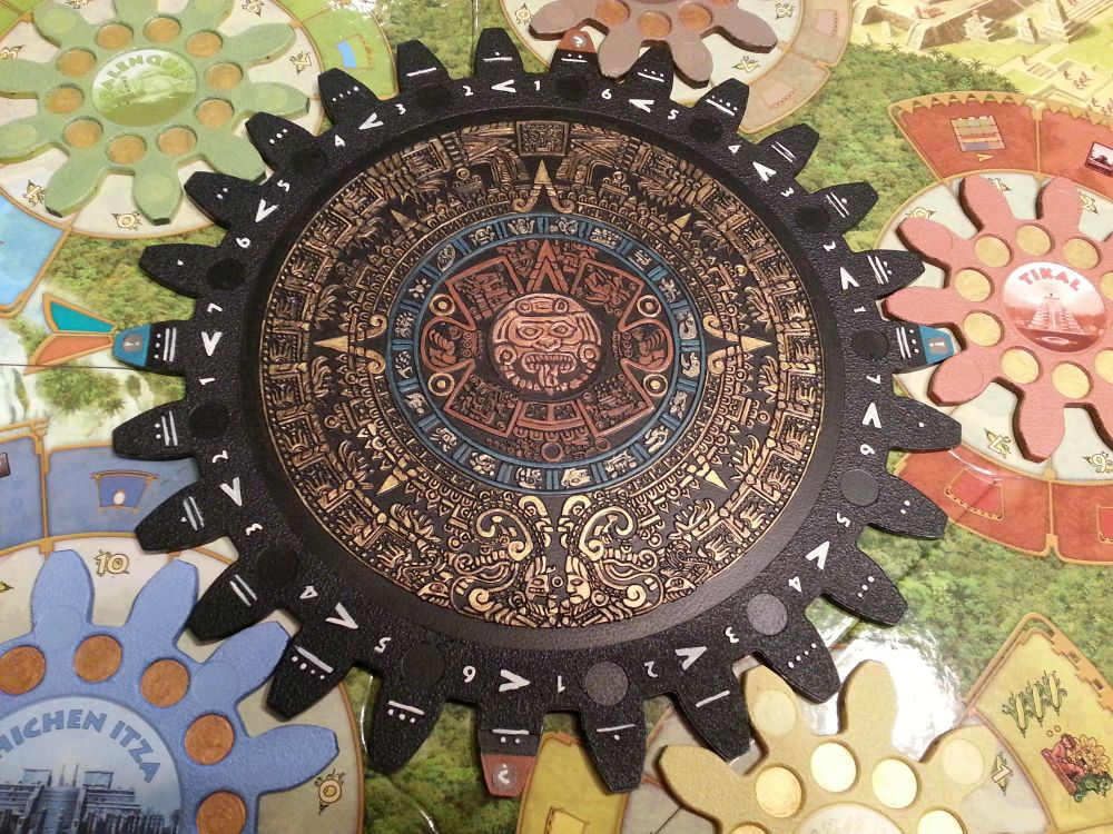 A hand-painted "gear" from the board game Tzolk'in.