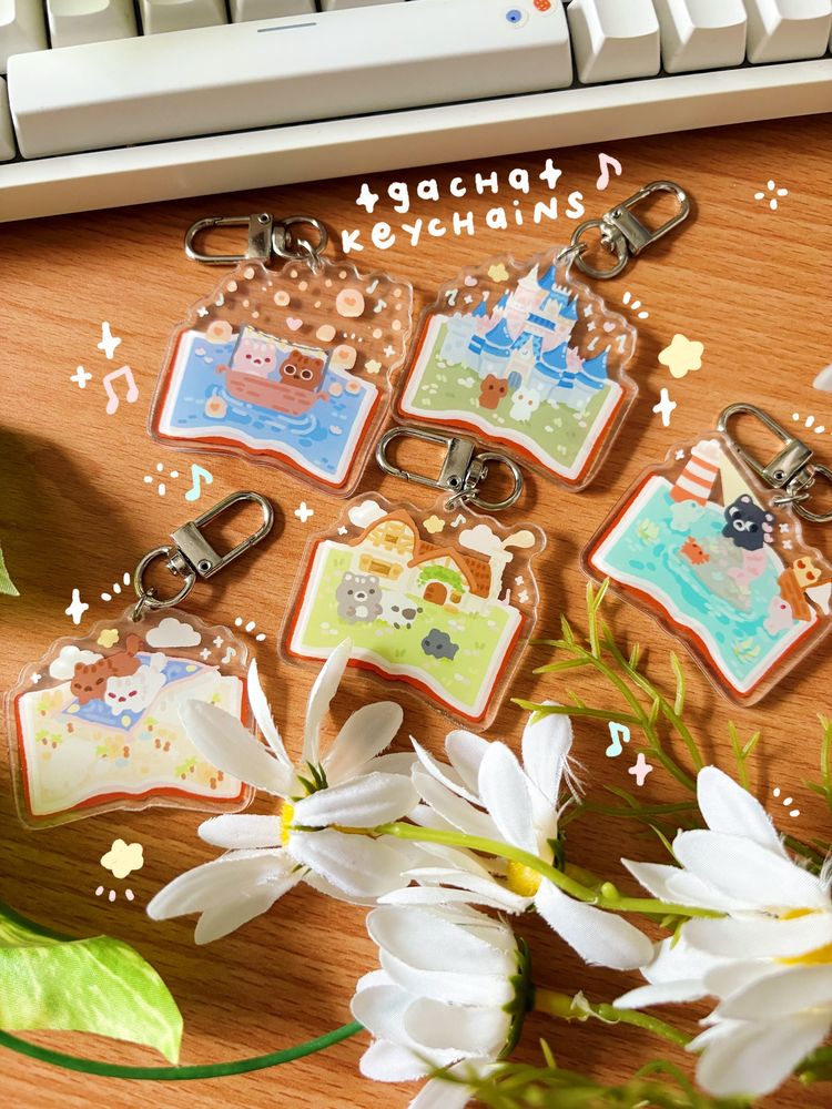 A photo showing the 5 possible keychains you can pull for our fairy tale keychains 💖