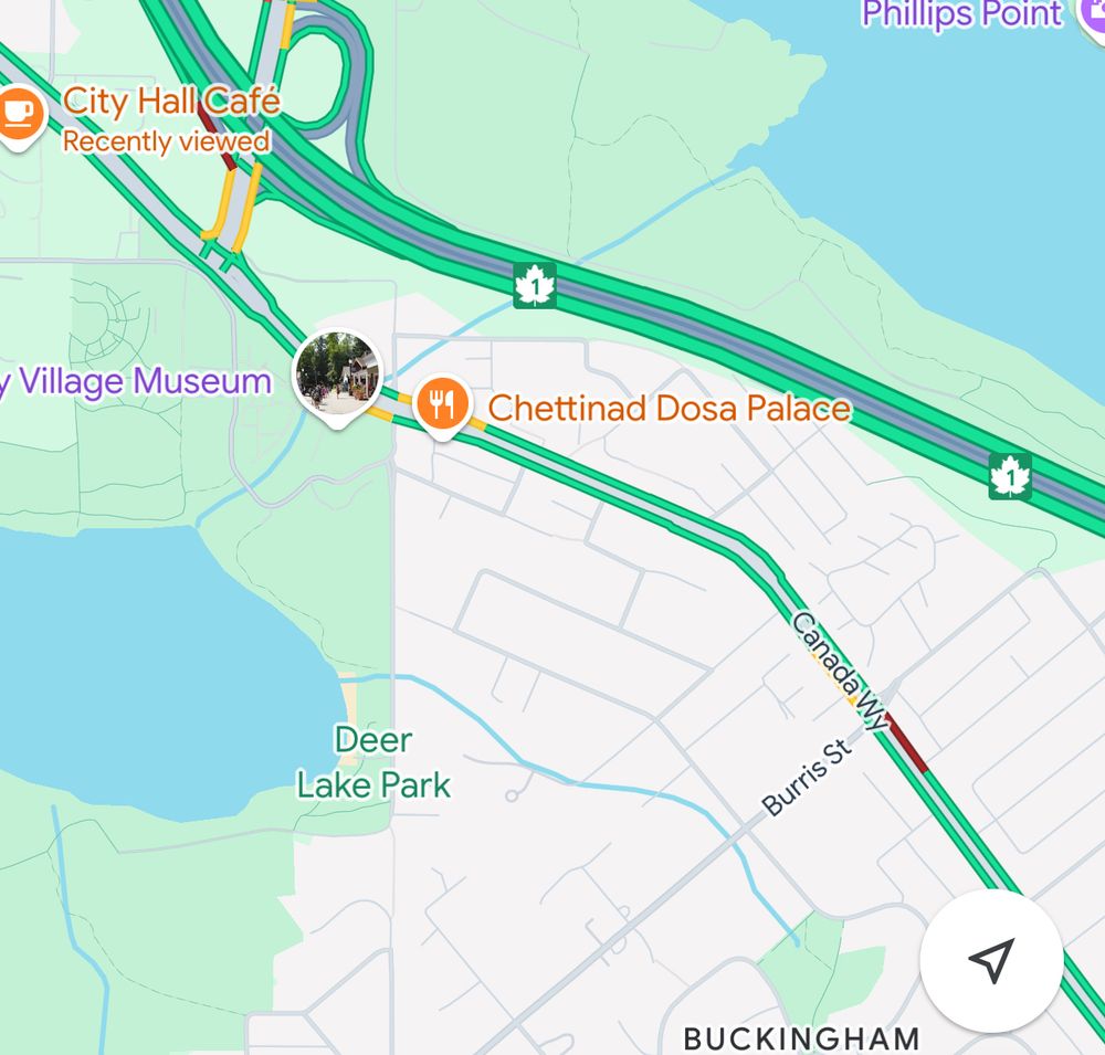 A map of the highway and road network in Burnaby BC that has lots of cars and then little suburban streets. Traffic is light due to this screenshot being from mid day on a Sunday 