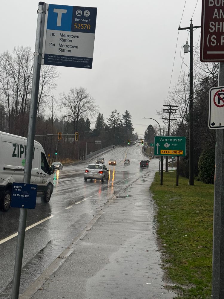 Wide wet overpass and freeway entrance for highway number 1 