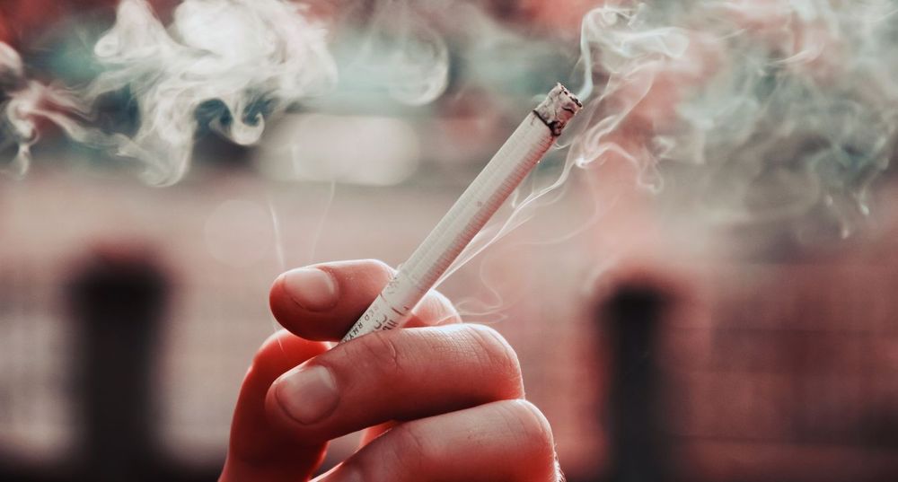 a lit cigarette, photo is zoomed in