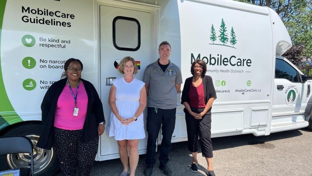 Onsite staff members stand outside the MobileCare Clinic in North Buxton. Pictured from left to right are Jessie Zabula, nurse practitioner student; Nicole Basiaco, nurse practitioner; Nick Zimmer, community paramedic; Edna Cornwall Shadd, CMHA mental health care coordinator.