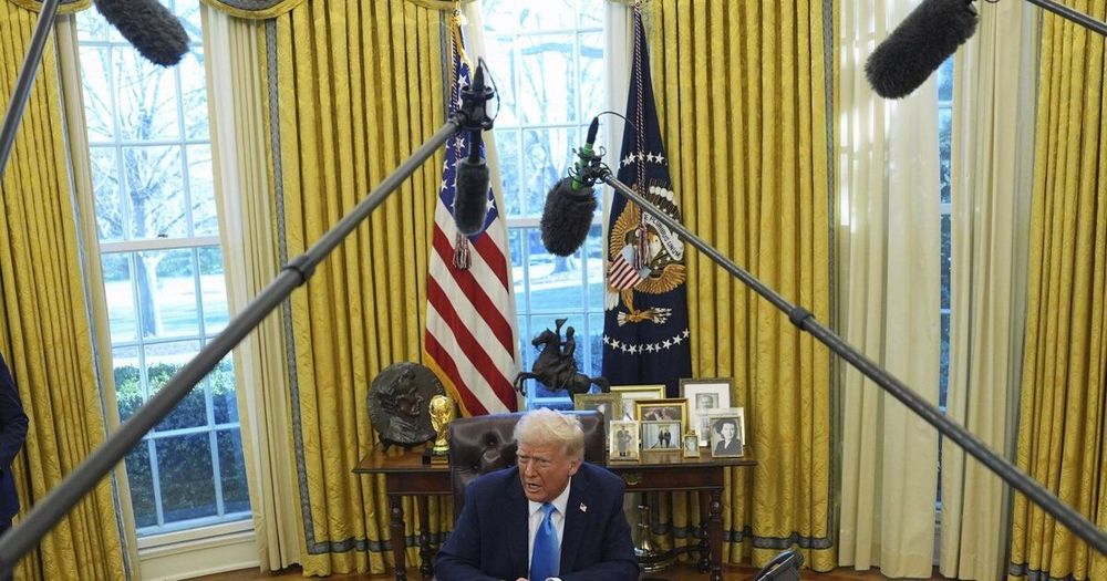 President Donald Trump speaks to reporters as he signs executive orders in the Oval Office of the White House, in Washington, Tuesday, Feb. 4, 2025. THE CANADIAN PRESS/AP-Evan Vucci