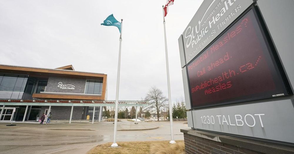 A sign outside Southwestern Public Health in St. Thomas, Ont. on Tuesday, March 4, 2025 warns residents to call ahead before visiting a doctor or hospital if they think they have the measles.